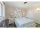 Bedroom with a queen-size bed and window views at 480 Azalea Rd, Venice, FL 34293