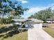 One-story home with attached garage and driveway at 480 Azalea Rd, Venice, FL 34293