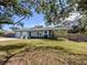 Landscaped lawn and curb appeal of the house at 4819 Greenleaf Rd, Sarasota, FL 34233