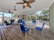 Enjoy this lovely screened porch with comfortable seating at 4819 Greenleaf Rd, Sarasota, FL 34233