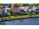 Aerial view of home with canal access, showcasing backyard at 4881 Flagstone Dr, Sarasota, FL 34238