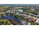 Aerial view of home nestled in community by water at 4881 Flagstone Dr, Sarasota, FL 34238