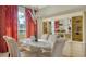 Elegant dining room featuring a modern table and statement chandelier at 4881 Flagstone Dr, Sarasota, FL 34238