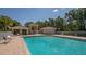 Relaxing community pool with plenty of seating and shade at 4881 Flagstone Dr, Sarasota, FL 34238