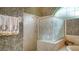 Large walk-in shower with glass enclosure and patterned tile at 4881 Flagstone Dr, Sarasota, FL 34238