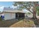 Home exterior showcasing a screened patio at 510 45Th E St, Bradenton, FL 34208