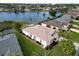 Aerial view of single Gathering home near lake at 5154 51St W Ln, Bradenton, FL 34210