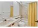 Bathroom with tub and yellow shower curtain at 5432 Hampstead Heath # 26, Sarasota, FL 34235