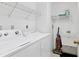 Laundry room with washer, dryer, and utility sink at 5432 Hampstead Heath # 26, Sarasota, FL 34235