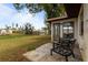 Backyard patio with wrought iron chairs at 5506 3Rd Avenue W Plz, Bradenton, FL 34209