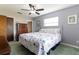 Spacious bedroom with a queen-sized bed and ample closet space at 5506 3Rd Avenue W Plz, Bradenton, FL 34209