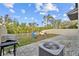 Backyard with patio, playground, and grill at 5546 Appleton Shore Dr, Apollo Beach, FL 33572