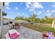 Backyard patio with seating and play area at 5546 Appleton Shore Dr, Apollo Beach, FL 33572