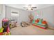 Playroom with toys and a race track at 5546 Appleton Shore Dr, Apollo Beach, FL 33572