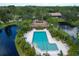 Aerial view of community pool and clubhouse at 5671 Ashton Lake Dr # 3, Sarasota, FL 34231