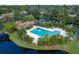 Community pool and clubhouse aerial view at 5671 Ashton Lake Dr # 3, Sarasota, FL 34231