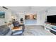 Open living area showcasing a kitchen pass-through and comfortable seating at 5671 Ashton Lake Dr # 3, Sarasota, FL 34231