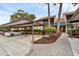 Covered parking area with parking spots and building access at 5671 Ashton Lake Dr # 3, Sarasota, FL 34231