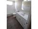 Updated bathroom with bathtub, toilet and vanity at 5893 Welcome Rd # I-7, Bradenton, FL 34207