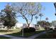 Landscaped community grounds with mature trees and walkways at 5893 Welcome Rd # I-7, Bradenton, FL 34207