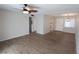 Living room with ceiling fan and wood-look floors at 5893 Welcome Rd # I-7, Bradenton, FL 34207