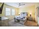 Relaxing bedroom with a ceiling fan and plenty of natural light at 5914 Fiore Dr, Bradenton, FL 34208