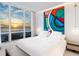 Bright main bedroom with ocean view, modern art, and stylish decor at 6100 Midnight Pass Rd # 401, Sarasota, FL 34242