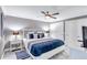 Bright bedroom with king-size bed, and calm color scheme at 6140 Midnight Pass Rd # 902, Sarasota, FL 34242