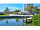 Private dock on a calm waterway at 6140 Midnight Pass Rd # 902, Sarasota, FL 34242