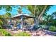 Outdoor gazebo with grill and seating at 6140 Midnight Pass Rd # 902, Sarasota, FL 34242