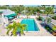 Refreshing community pool with ample seating at 6140 Midnight Pass Rd # 902, Sarasota, FL 34242