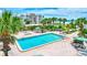 Resort-style pool with lounge chairs and beach access at 6140 Midnight Pass Rd # 902, Sarasota, FL 34242