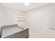 Simple bedroom with gray bed frame and window blinds at 6515 Mauna Loa Blvd, Sarasota, FL 34241