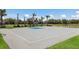 Outdoor basketball court with newly paved surface at 6527 Clairborne Ln, Bradenton, FL 34211