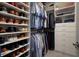 Well-organized closet with shoe storage and hanging space at 6527 Clairborne Ln, Bradenton, FL 34211