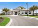 Community clubhouse with ample parking and welcoming entrance at 6527 Clairborne Ln, Bradenton, FL 34211