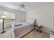 Cozy bedroom with window coverings and ample space at 6946 Woodwind Dr # 2, Sarasota, FL 34231