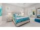 Spacious bedroom with a plush bed and sitting area at 6947 Lennox Pl, University Park, FL 34201