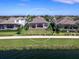 Back of house and surrounding homes, overlooking lake at 7917 Mainsail Ln, Sarasota, FL 34240