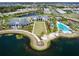 Community overview showing clubhouse, pool, and lakefront at 7917 Mainsail Ln, Sarasota, FL 34240