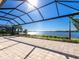 Spacious covered patio with lake view at 7917 Mainsail Ln, Sarasota, FL 34240