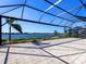 Expansive covered patio with lake views at 7917 Mainsail Ln, Sarasota, FL 34240