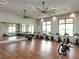 Bright fitness center with various exercise equipment including stationary bikes and rowing machines at 7917 Mainsail Ln, Sarasota, FL 34240