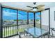 Spacious lanai with table and chairs and a view at 797 Beach Rd # 305, Sarasota, FL 34242