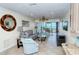 Spacious living room featuring comfortable furniture and an ocean view at 797 Beach Rd # 305, Sarasota, FL 34242