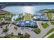 Aerial view of community amenities and lakefront at 8253 Grande Shores Dr, Sarasota, FL 34240