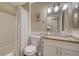 Cozy bathroom with shower and tub combo, vanity, and neutral color scheme at 850 S Tamiami Trl # 408, Sarasota, FL 34236