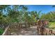 Wooden boardwalk winding through lush greenery, offering a scenic path at 850 S Tamiami Trl # 408, Sarasota, FL 34236