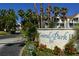 Entrance sign for 'Central Park' community, surrounded by lush tropical landscaping at 850 S Tamiami Trl # 408, Sarasota, FL 34236