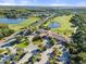 Aerial view of community clubhouse and golf course at 9109 Winter Harbour Way, Bradenton, FL 34212